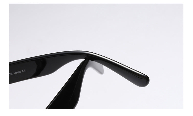 Close-up of black oversized eyeglass frames square eyeglasses temple arm by Sunglass Lover