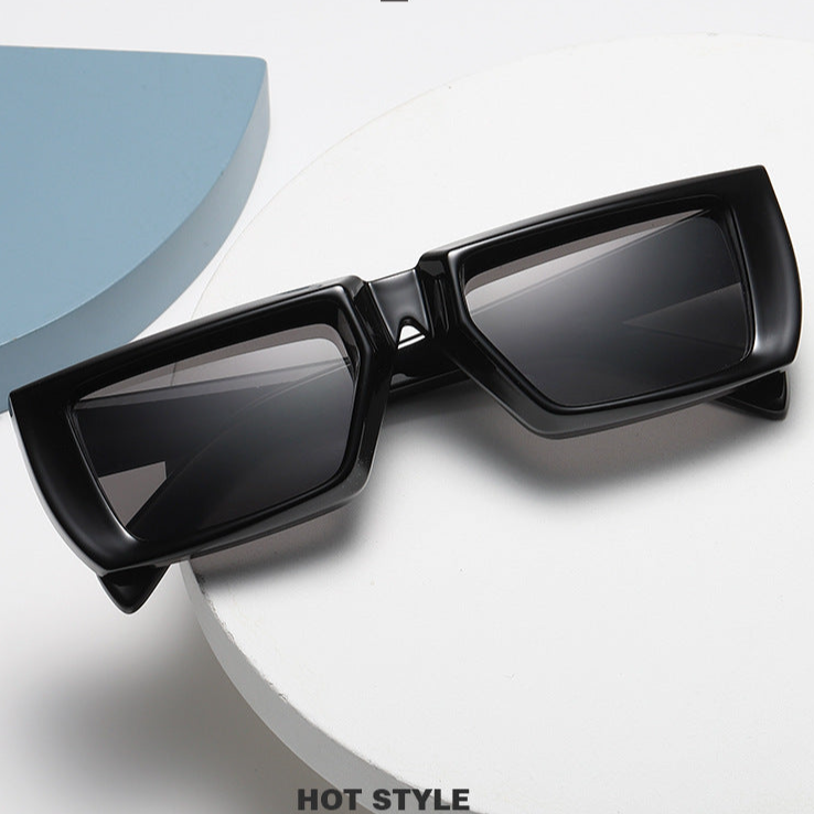 Black hip hop rectangle sunglasses with thick frames by Sunglass Lover on white surface