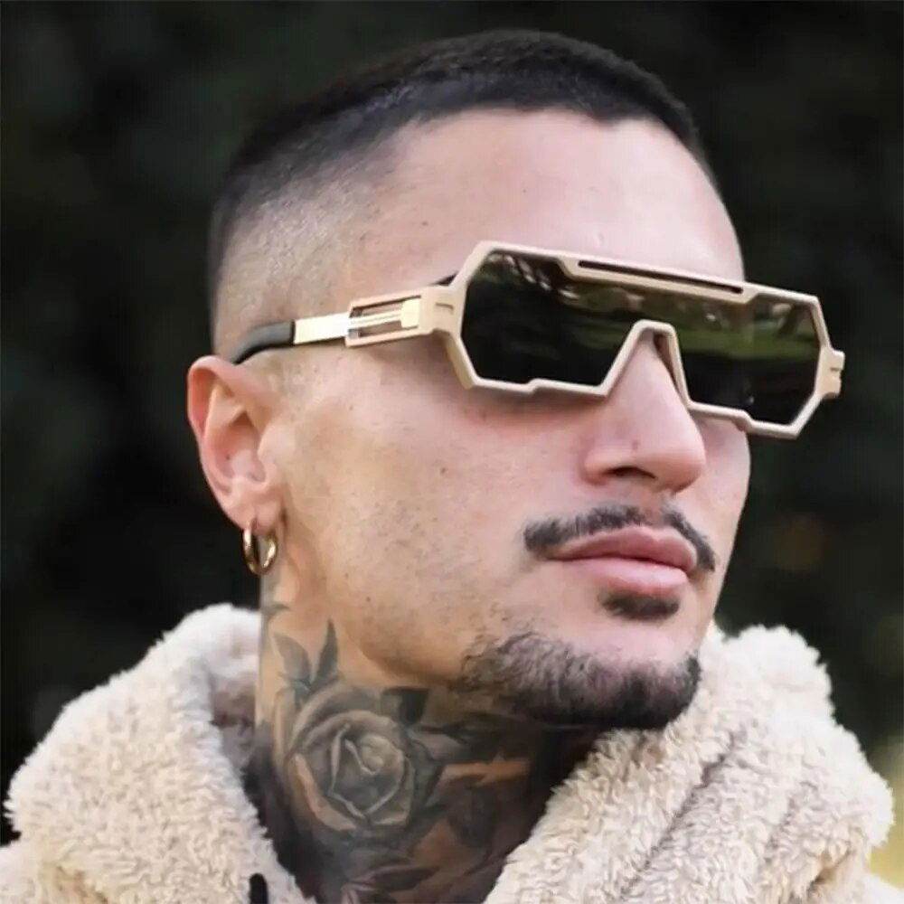 Sunglass Lover square vintage punk sunglasses gold geometric frame worn by tattooed model outdoors