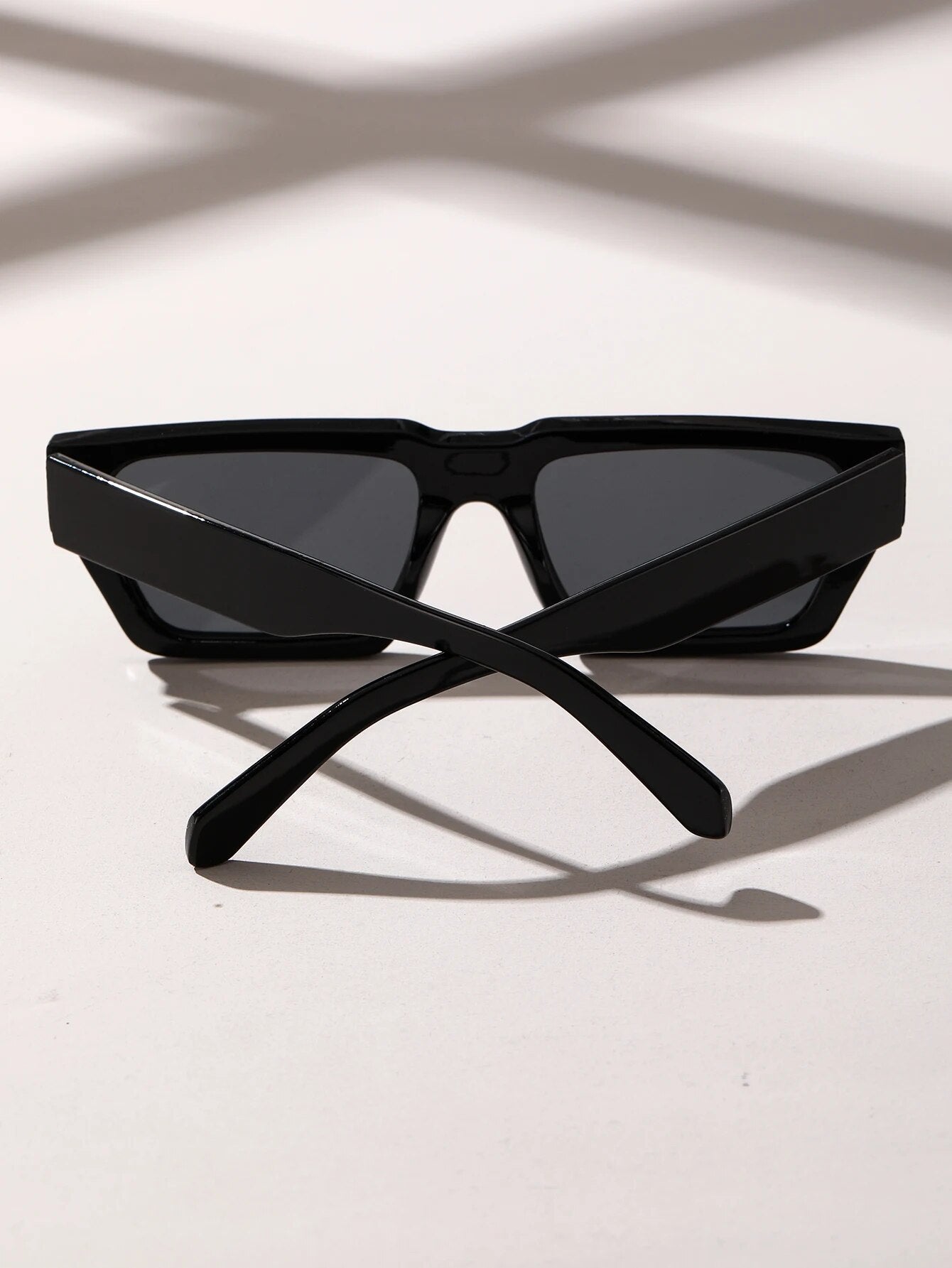 Black square sunglasses for men by Sunglass Lover with a modern rectangular frame design