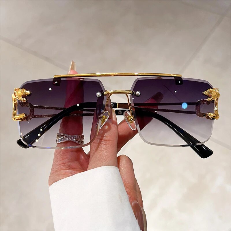 Jim Jack double bridge sunglasses rimless design with gold accents and gradient purple lenses