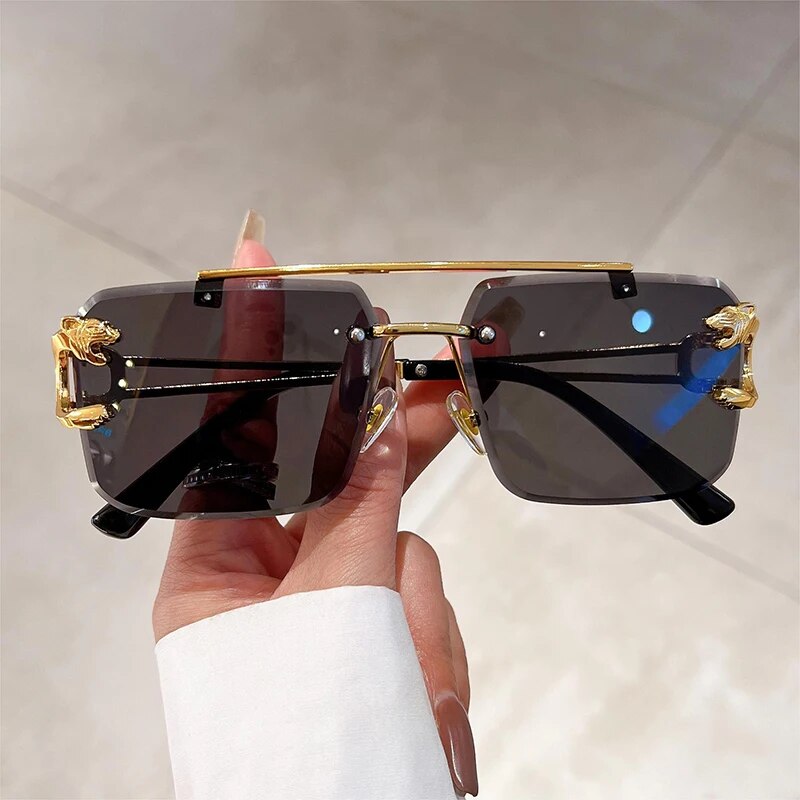 Jim Jack double bridge sunglasses rimless design with gold accents and dark lenses by Sunglass Lover