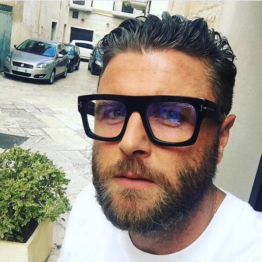 Man wearing oversized eyeglass frames square eyeglasses by Sunglass Lover outdoors
