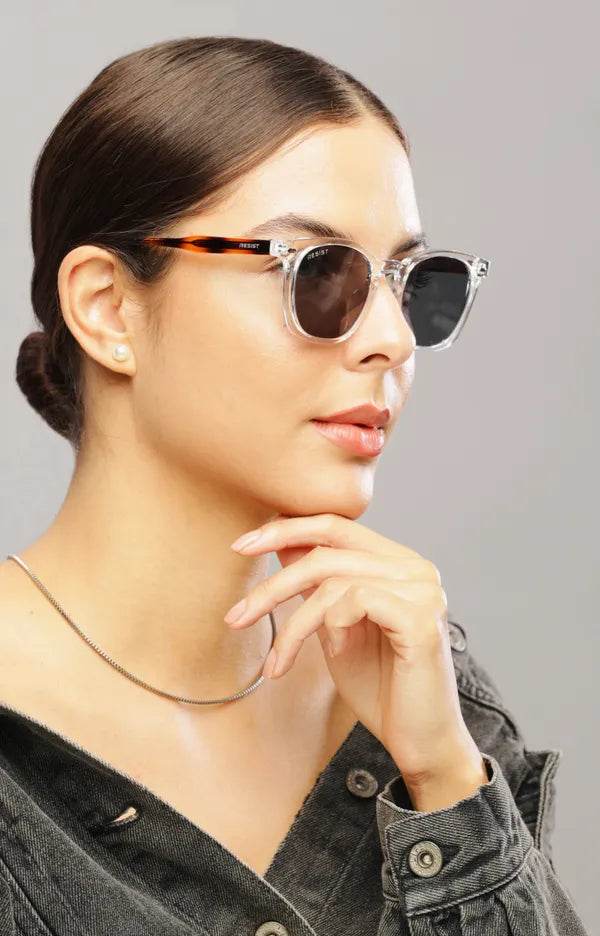 Sunglass Lover square sunglasses with dark lenses on female model lifestyle shot black oval sunglasses for men