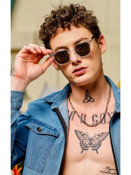 Male model wearing Sunglass Lover black oval sunglasses for men with clear frame and denim jacket