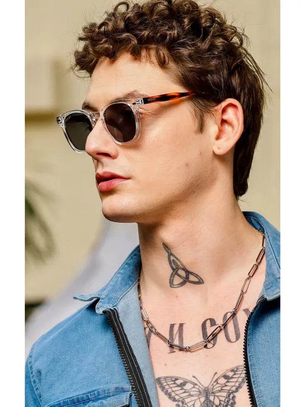 Sunglass Lover black oval sunglasses for men worn by male model with clear tortoiseshell frames