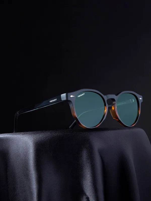 Sunglass Lover Marc oval green sunglasses round tortoiseshell frame with green lenses on black cloth