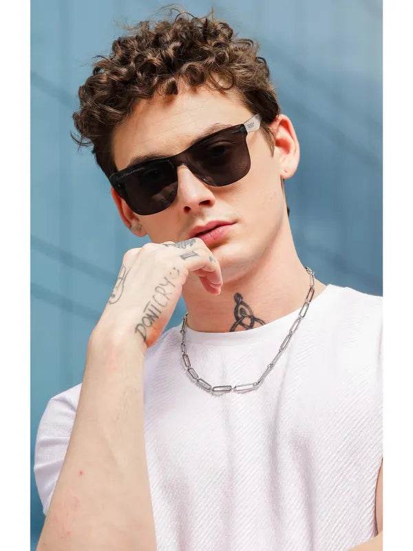 Sunglass Lover model wearing Risen Blaze Weyfarer sunglasses with black lenses and clear temples