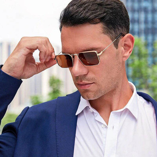 Sunglass Lover gold frame rectangle retro sunglasses for men and women worn by man in navy blazer